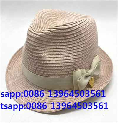 Gaiši rozā sieviešu papīra salmu fedora vāciņa saules cepure